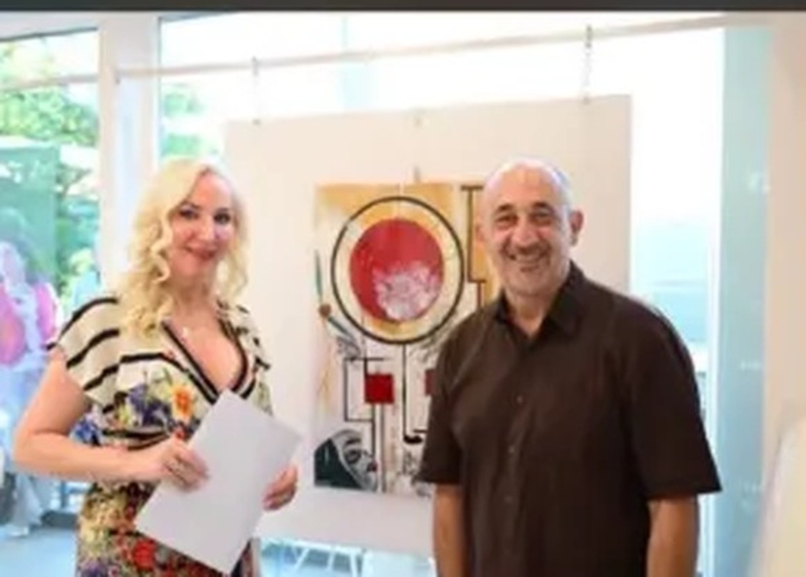 Gerasis Dimitris at an exhibition of his paintings